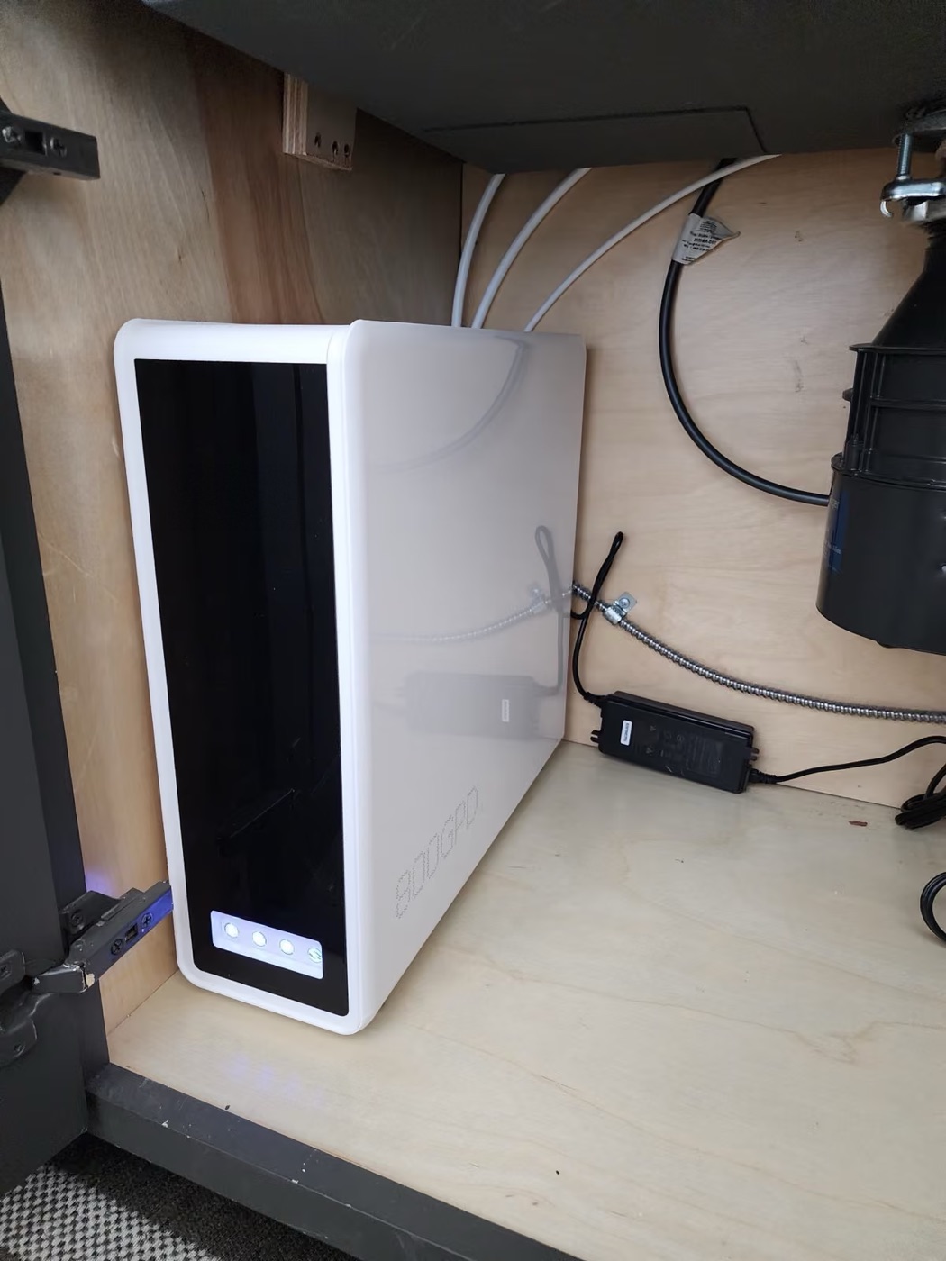 Tankless reverse osmosis fitted in a sink cabinet 2